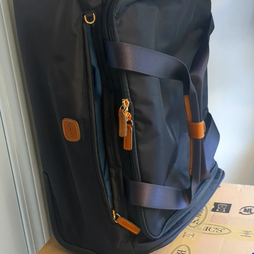Rolling Duffel Bag - 21 Inch Carry On Travel Bag for Men and Women - Lux…